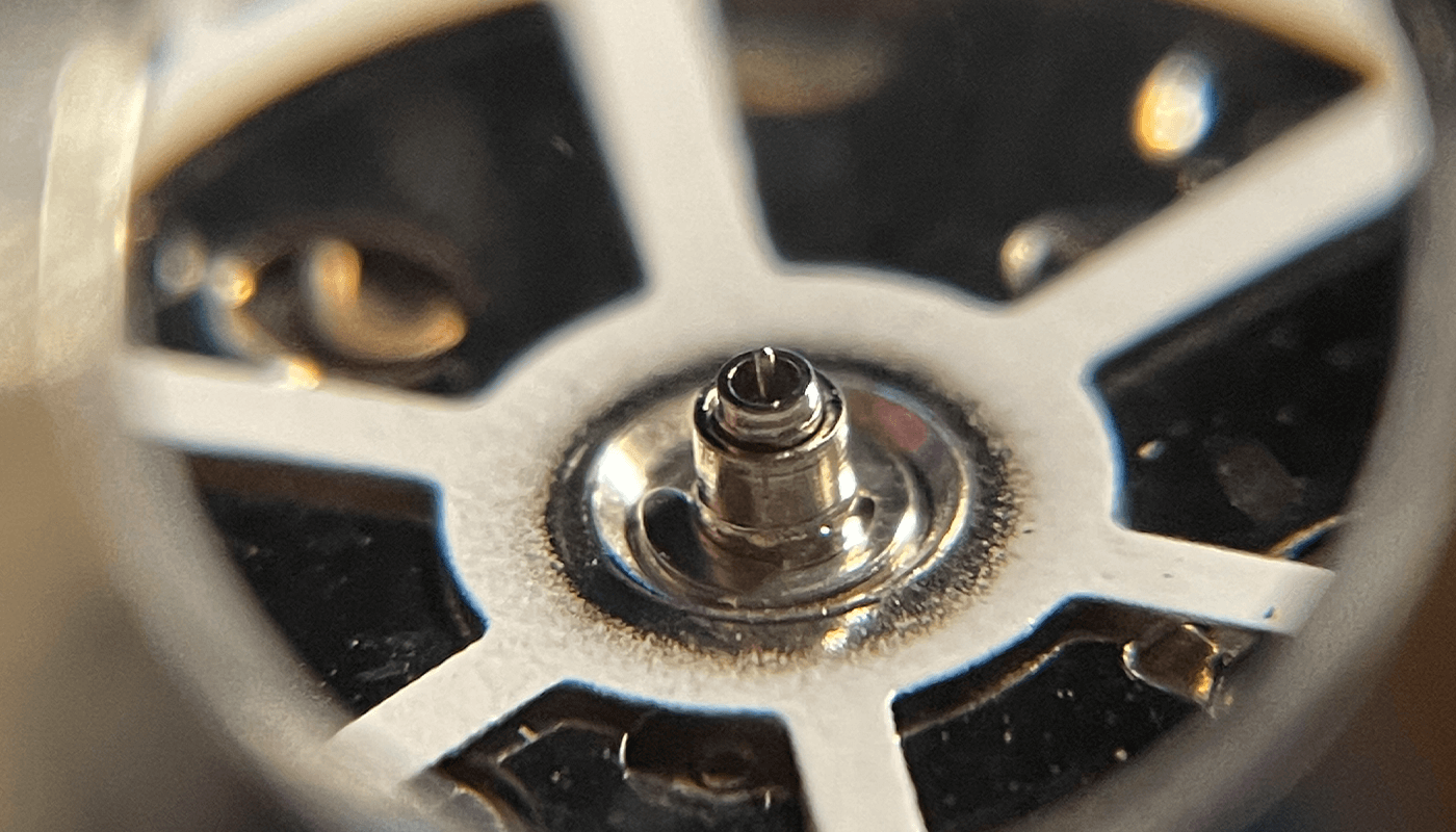 Close up of 2813 dial with hour, minute and second hands
