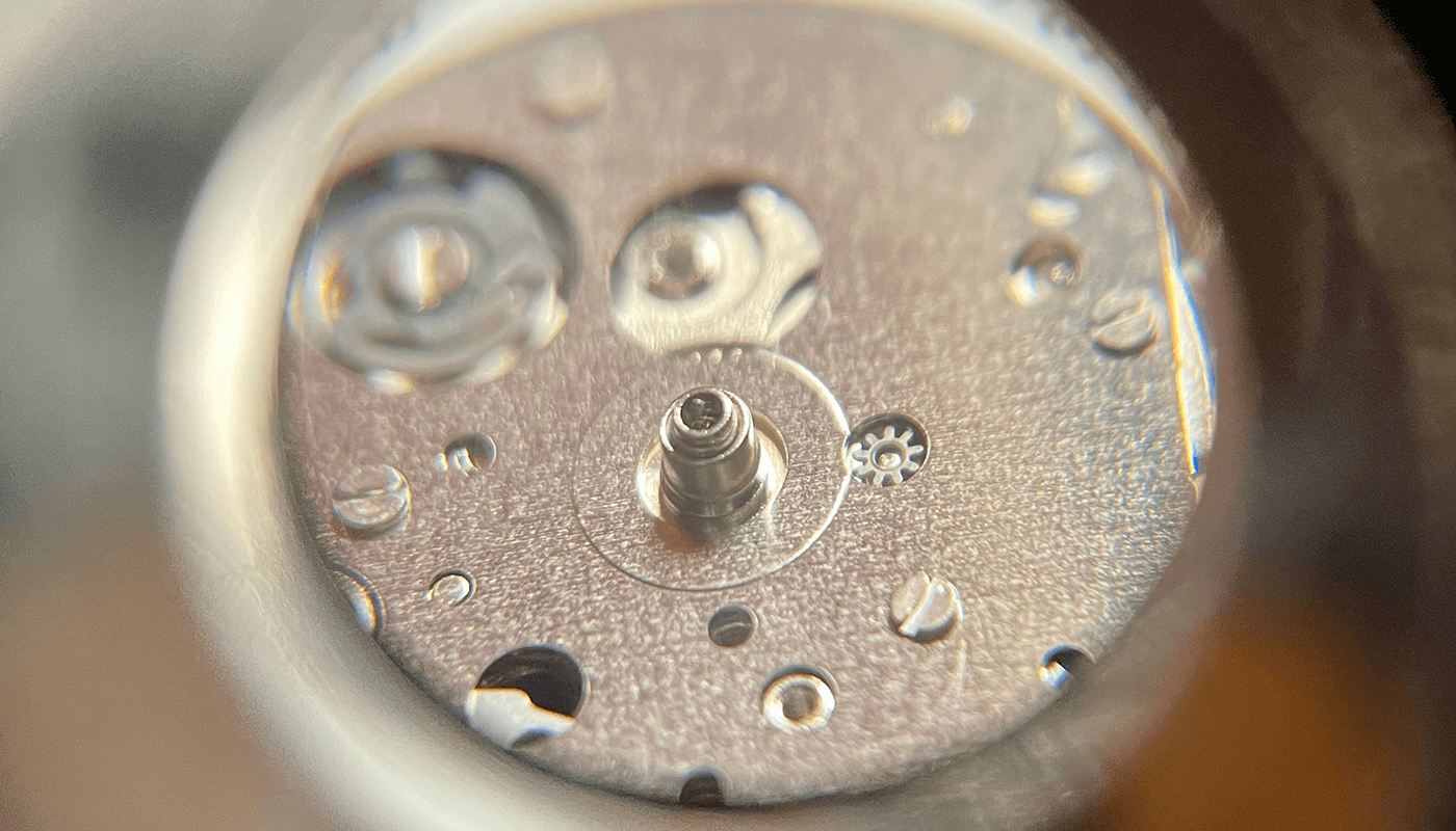 Close up of 8215 dial with hour, minute and second hands